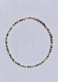 Clove green freshwater pearl necklace with earthy layered tones and gold accents