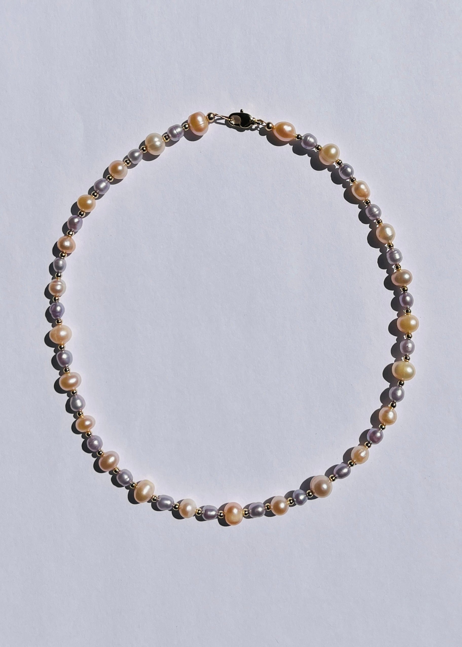 Flora peach and lilac freshwater pearl necklace with gold accents