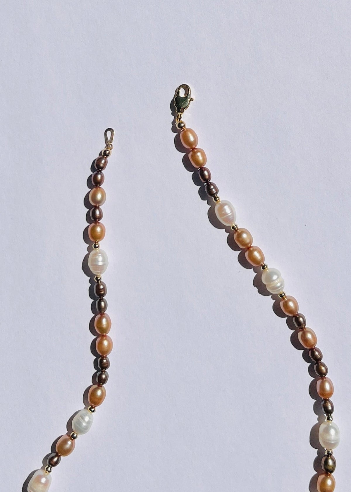 Detail of bronze pearls and gold-filled accents on the Clove necklace