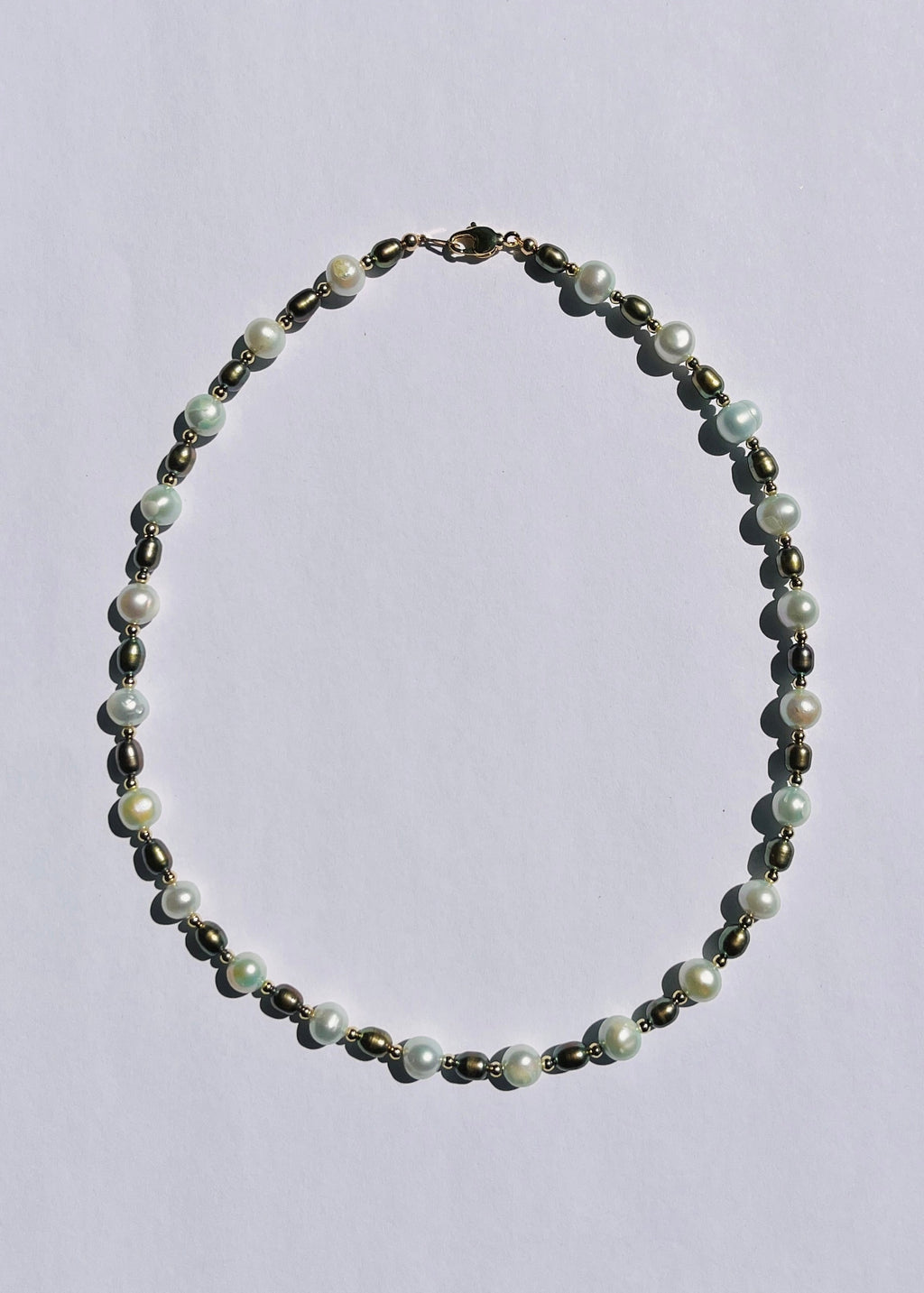 Nami seafoam blue and pine green freshwater pearl necklace with gold accents