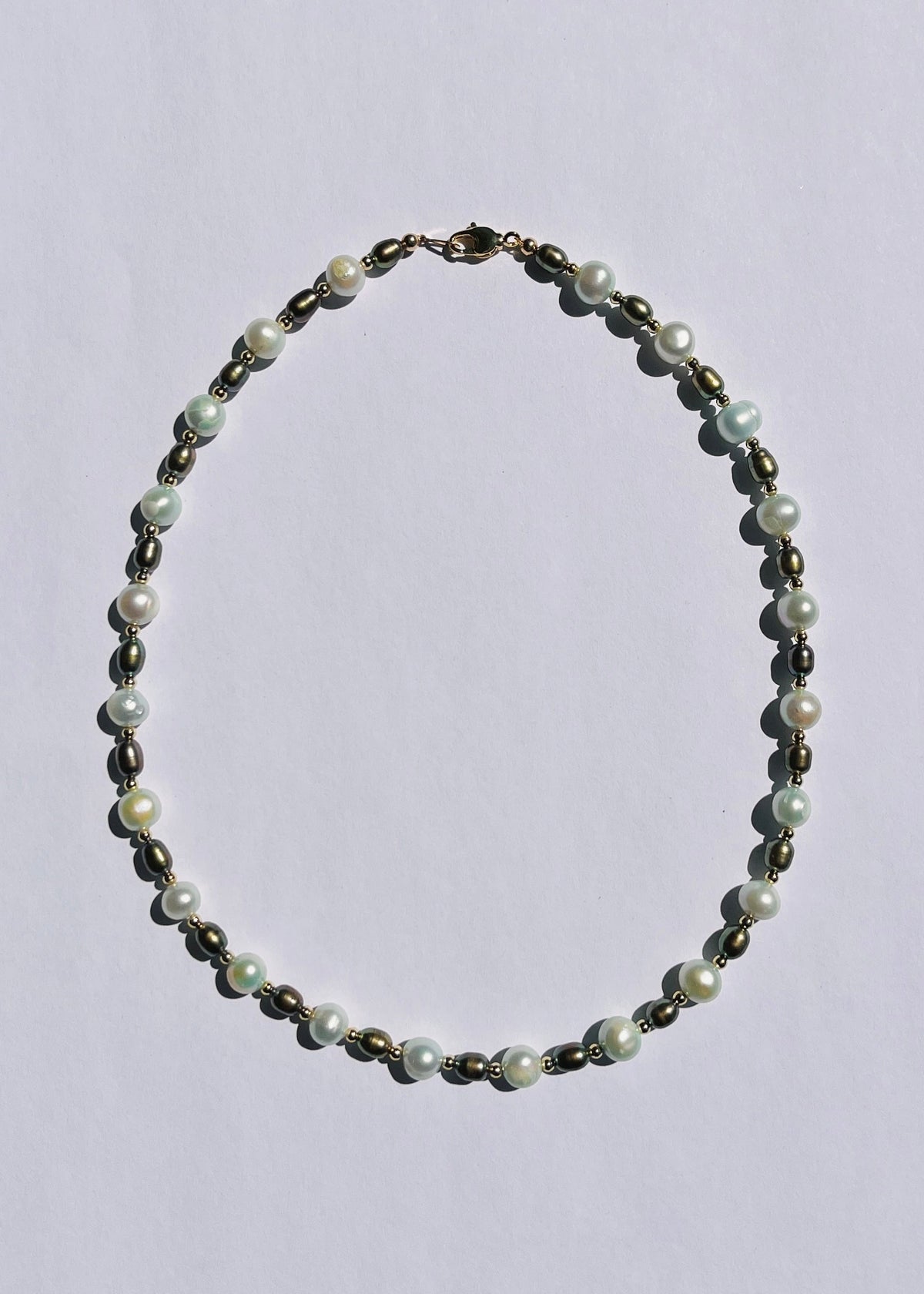 Nami seafoam blue and pine green freshwater pearl necklace with gold accents