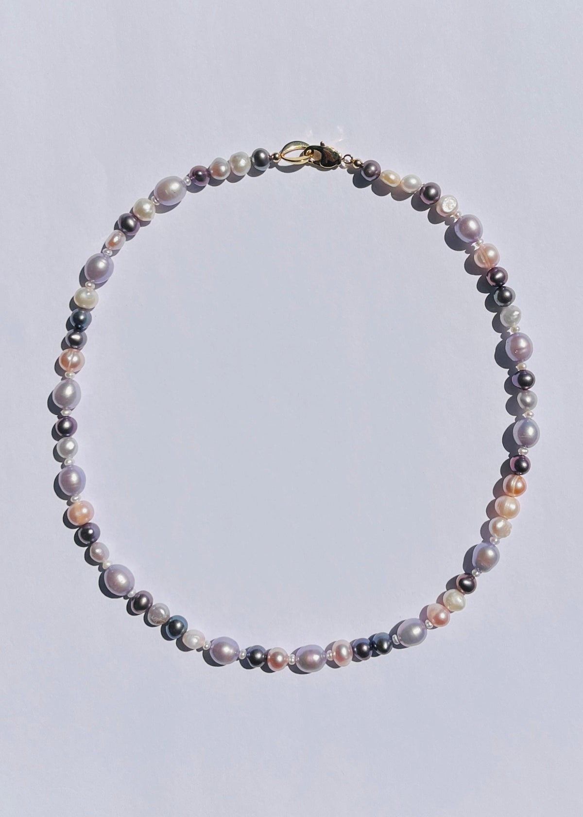 Umeko purple freshwater pearl necklace with mauve and white pearls